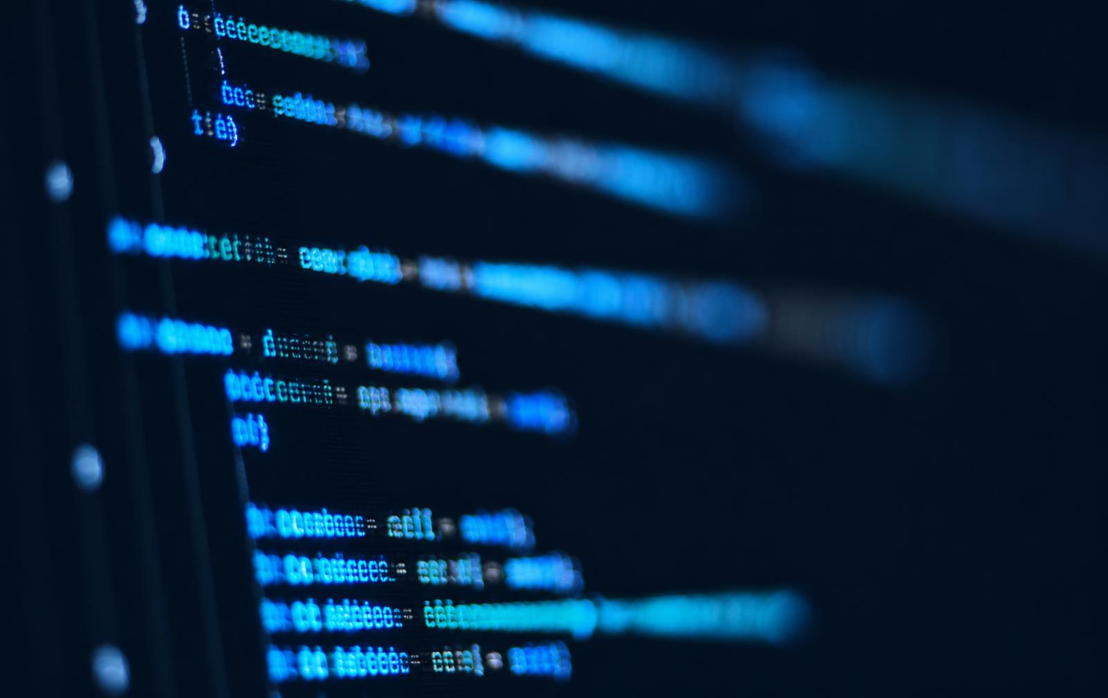 Close-up of syntax-highlighted source code on a dark screen